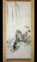 Two monkeys are seen at the base of a waterfall. They are painted in soft shades of gray and sit among plants. The monkey on the right fidgets with its hands, while the other looks over its shoulder at the waterfall. This is a pair with 1986/2.61.2.