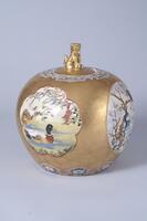 A bronze colored porcelain urn. Includes images on each side.