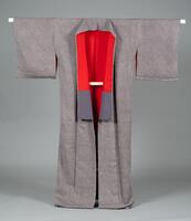 <p>light brown-gray shibori kimono with red and lavender-gray inner lining.</p>
