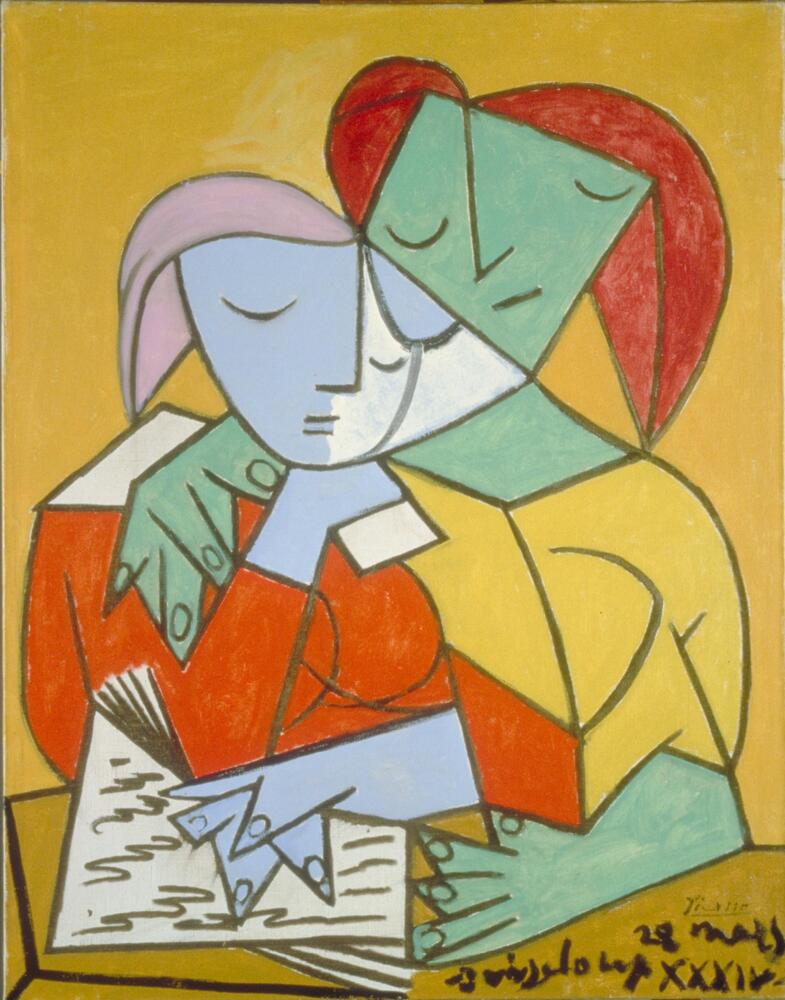 Two girls, depicted in bold geometric shapes and block colors, reading a book together. The figure seated at viewer's right, slightly taller, is green and wearing yellow. The figure at viewer's left has a face of blue and white and is clothed in red resting her clasped hands upon an open book.