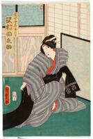 This is a print of a woman.  She wears a dark striped robe with red trim.  Behind her is a room partition in front of paper walls and a wooden sliding door.  The sash she is carrying is black with gold trim on one end and two Chinese characters.<br />
 <br />
Inscriptions: Artist’s signature: Kunisada ga; Publisher’s seal: Shitaya, Aito; Censor’s seal: Aratame, I 3; Kunishichi nyōbō Okaji, Sawamura Tanosuke