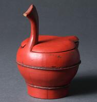Red lacquered wooden duck-shaped container wth lid