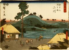 Group of people carrying parcels and leading horses in front of a shop. Other travelers can be seen crossing in the distance. There is a tall tree by the store, and across the water is a smal hill with trees on it. The skyline is edged in pink, suggesting dawn or dusk. Writing in upper right and left corners. Title in red box in upper right corner.