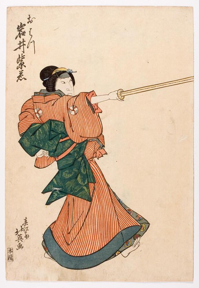 The woman in this print wears a red striped robe with crests on the sleeves and back.  Her robe is blue and green, and her feet are bare.  She wields a wooden sword in front of her.<br />
 <br />
Inscriptions: Artist’s signature: Hokuei ga; Publisher’s seal: Honsei; Ohatsu, Iwai Shijaku<br />
 <br />
This is the left panel of a diptych (with 2003/1,590.2).