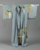 <p>light blue (probably silk) houmongi&nbsp; kimono with tegaki yuuzen (hand-painted stencil dyed) and embroidered white, light green, and orange fujimoyou (wisteria) motifs with no inner lining (hitoe).</p>
