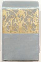 Aqua-gold fabric woven from turquoise warp and aqua-and pale gold-covered paper (kinran) weft, for a shimmering aqua-gold ground.  The deco-style daffodil patterns are surihaku in three shades of gold.  Plain weave aqua silk lining.
