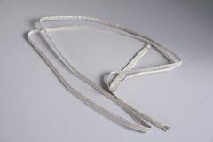 Cord made of thin woven silver metallic thread.