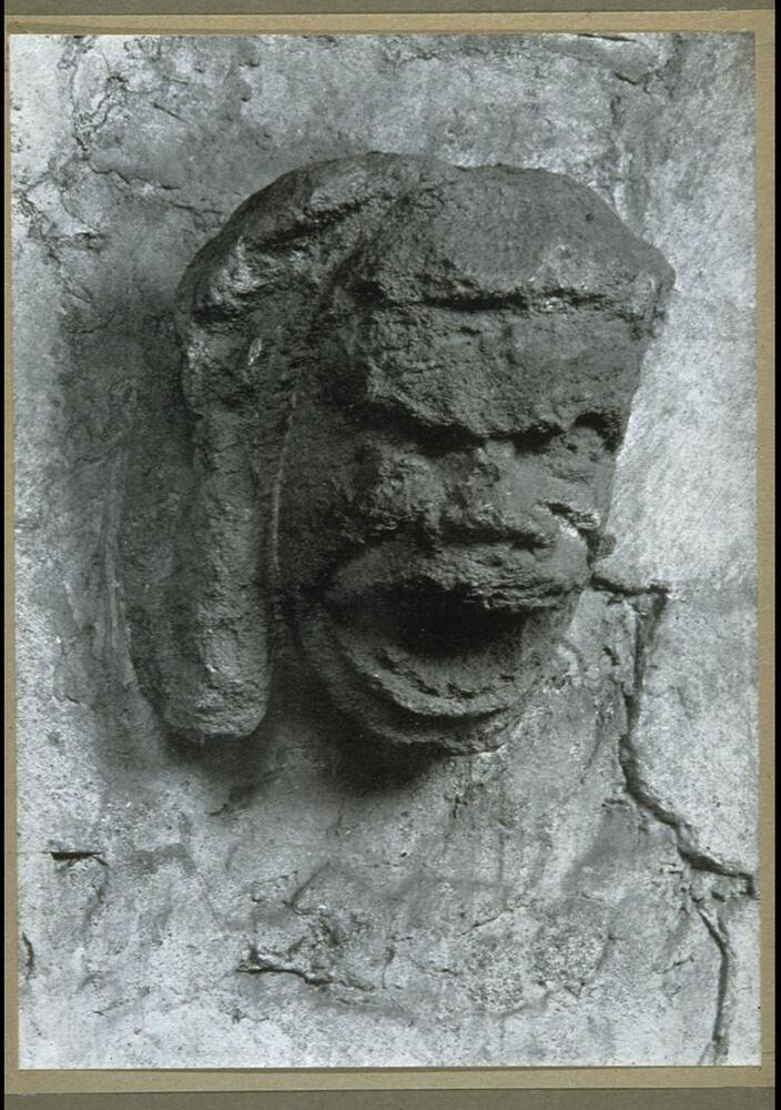 This image depicts a close-up view of a stone grotesque from Ely Cathedral. 