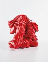 Layers of red liquid plastic poured on top of each other.