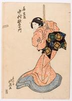 The woman in this print wears a pale red robe with a blue edge on the bottom.   Her sash is black with green, blue, and yellow crests.  She holds a wooden sword in both hands up to her right shoulder.<br />
 <br />
Inscriptions: Artist’s signature: Hokuei ga; Publisher’s seal: Honsei; Tsubone Iwafuji, Nakamura Utaemon<br />
 <br />
This is the right panel of a diptych (with 2013/1.590.1).