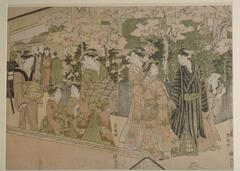 An image of  women walking down the street. The woman at the forefront is trailed by two young girls and another woman. They wear similarly pattererned kimono with geometric designs and orange and green coloration. To the right of them are two women talking to two men, one crouched behind the other, under cherry blossom trees. The women appear to wear kimono of orange color and patterened with leaves. The first man wears a black striped kimono and a sword hilt can be seen strapped to his waist while the man behind him wears grey. In the background is a building and a group of men walking about. In the center of the background, inside the building, a woman can be seen.