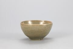 <p>The wide mouth of this cup gives it a form similar to that of a bowl. The foot has its glaze removed and has three refractory spur marks. Fine crackles are spread throughout the inner wall. The glaze is well fused, produing a shiny surface.<br />
[<em>Korean Collection, University of Michigan Museum of Art </em>(2014) p.121]<br />
&nbsp;</p>
