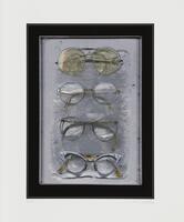 Image of a column of four pairs of eyeglasses in a wet edged tin. 