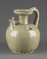 A porcelaneous stoneware, globular bodied ewer with a narrow, flaring neck, a dish-shaped mouth, a handle in the form of a dragon head and a neck extending from the rim to the shoulder.  The spout is in the form of a chicken head and two lug handles are on the shoulder.  It is covered in a pale gray green glaze. 