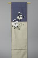 <p>Alternating light beige and medium blue maru (double-sided) obi with hand-painted and embroidered gray and white chrysanthemums, orchids, autumnal leaves, plum blossoms, and bamboo leaves.</p>
