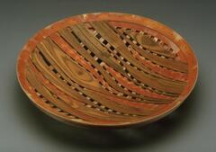 layered wood plate with visible supports